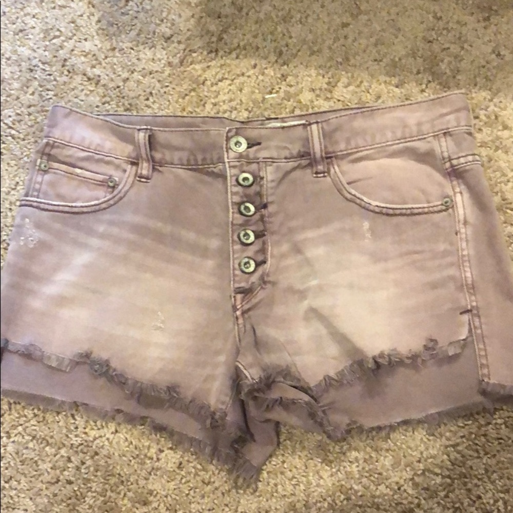 Fun button up purple cut off shorts.